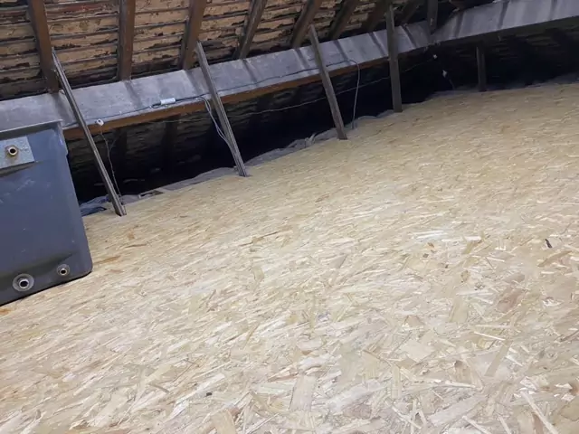 Boarding laid round a cold water tank