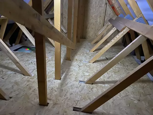 Boarded floor between trusses